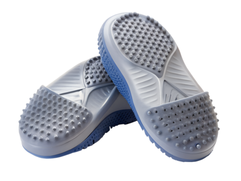 Pair of blue and gray casual shoes with textured sole isolated on transparent background