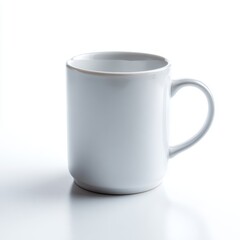 Obraz premium A simple, white ceramic coffee mug, empty, isolated on a pure white background. Beverage, simple.