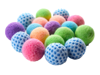 A collection of colorful fuzzy balls with dot patterns, isolated on transparent background