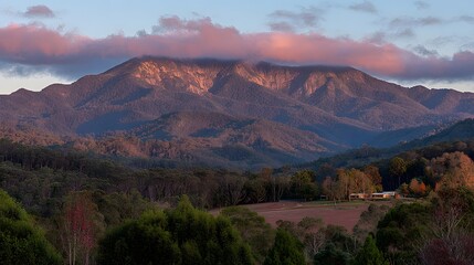 Mountain range at dawn, colored by the rising sun.