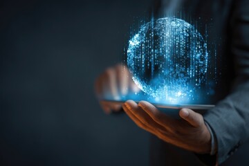 Businessman holds tablet, digital globe of binary code