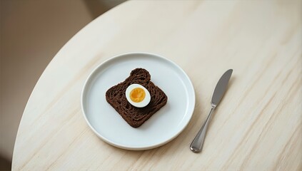 Minimalist Breakfast of Egg on Rye Bread