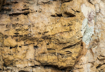 the structure of the rock surface in the section, quarrying in the natural environment, sunny day