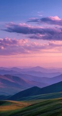 Fototapeta premium Pastel mountain range at dawn/dusk. Soft hues of pink and purple