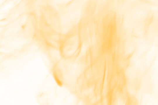 Vibrant abstract flames dance in a mesmerizing display of fiery orange and yellow hues against a dark mysterious background evoking warmth and energy