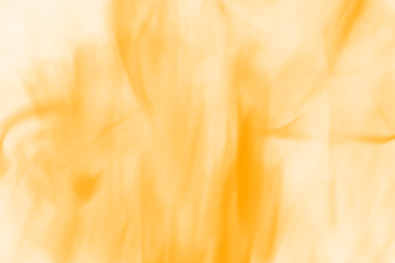 Close up view of vibrant orange and yellow flames dancing upwards showcasing the intense heat and dynamic movement of fire in a dark abstract setting
