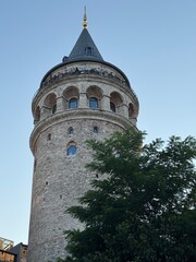 Obraz premium Evening view of the Galata Tower (Galata Kulesi) in Istanbul, Turkey. Built in the 14th century by the Genoese. 