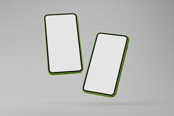 Two green smartphones floating with blank screens on grey background