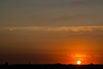 Fototapeta premium Silhouette of cityscaper buildings during a sunset in Brazil