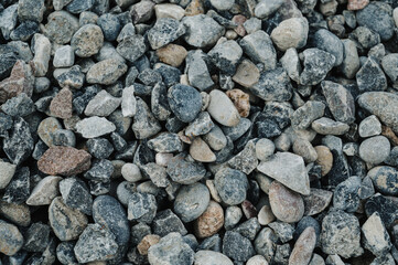 Multi-colored pebbles on a pebble beach