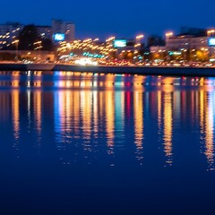 City Lights Reflection on Water at Night, Urban Landscape, Dark Blue Sky