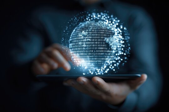 Holographic globe of binary code displayed on a tablet