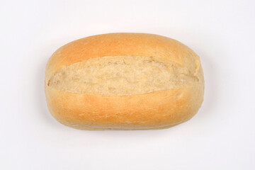 A single oval-shaped roll with a characteristic crease is placed on a white background, photographed from above