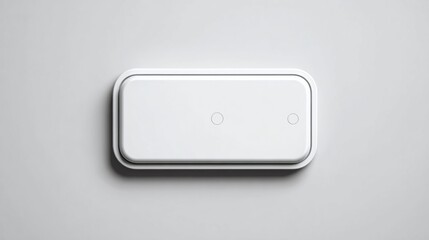 Fototapeta premium Minimalist modern device on neutral surface, showcasing clean geometric design. 