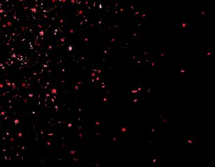 Red confetti explosion on black