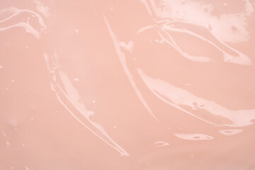 Pink lotion beauty skincare cream texture cosmetic product background