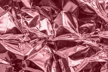 Luxury shiny metallic rose gold foil crumpled texture background