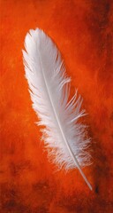 A single white feather rests vertically on a textured orange surface