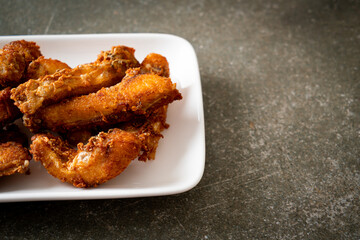 Fried Snapper Belly on white plate