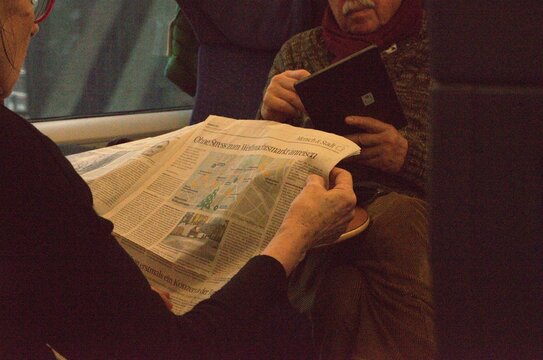 people reading in train