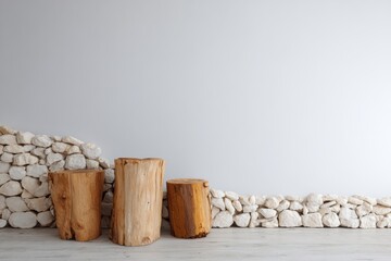 Wooden stumps floor with stone wall