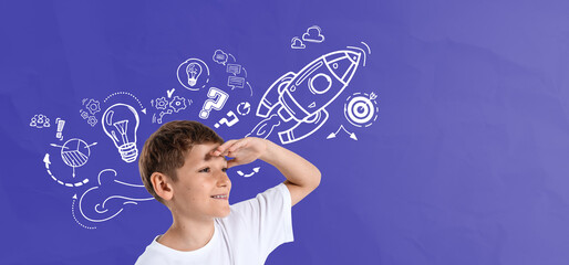 Smiling boy looking forward with imaginative doodles of rocket,