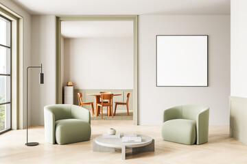 Modern minimalist living room interior with blank square poster mockup on wall above green armchairs and round coffee table in bright clean space. 3D Rendering