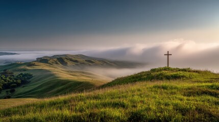 Obraz premium Cross on Hilltop with Fog: Faith, Hope, and Christian Symbolism in a Serene Landscape