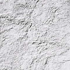 Rough white plaster wall surface closeup