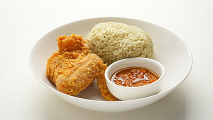 Nasi daun jeruk ayam goreng, aromatic rice with fried chicken and chilli sauce
