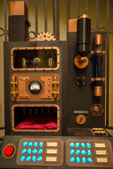 steampunk machine with buttons, tubes and lamps