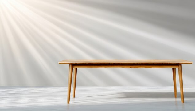 Light-filled room with empty light brown wooden table