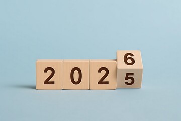Wooden Blocks Representing the Transition from 2025 to 2026 – Symbolizing Change and Progress