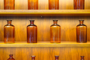 empty perfume glass bottles on shelves