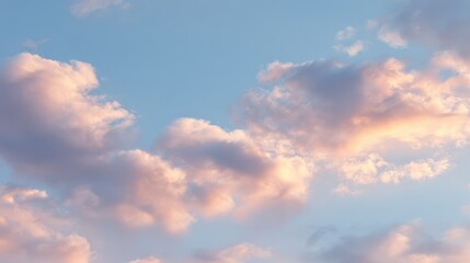 Obraz premium Dreamy Sky with Clouds at Sunset: Soft Pastel Colors and Peaceful Atmosphere, Perfect for Backgrounds