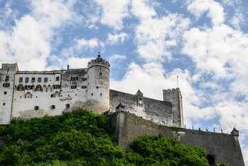 Fototapeta premium Historic old town of Salzburg and Hohensalzburg Fortress atop the Festungsberg hill in Salzburg, Austria
