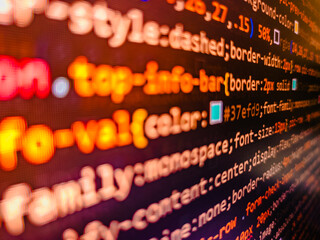 Data in binary code. Closeup of Java Script and HTML code. Program. Programmer occupation job. Business and AI technology represent learning process