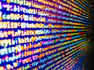 Source code photo. Closeup of Web Code on Computer LED Screen. Search engi. Information technology website coding standards for web design. Web server data on a monitor
