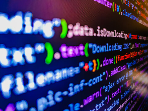 Software developer programming code. Key password theft hacking firewall concept Blurred screen with selective focus. Malware is hidden in the code