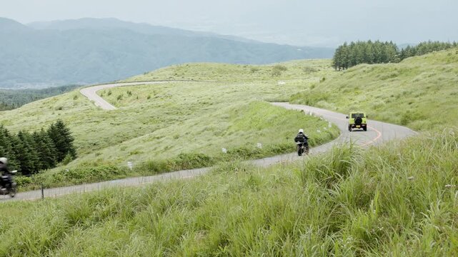 Winding Road that Runs through the Scenic Hills of the Highlands.Drive to a Cool Summer Resort | Kirigamine Plateau, Nagano, Japan