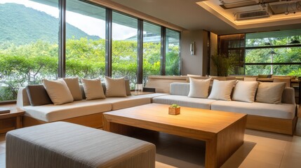 Fototapeta premium Modern Hotel Lounge with Comfortable Seating, Large Windows, and a View of Lush Greenery