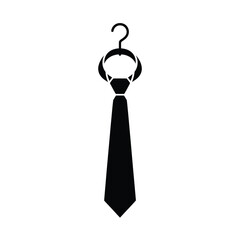 Black tie hanging on a clothes hanger