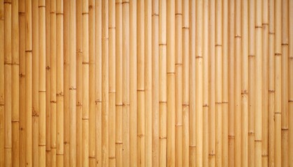 "Close-up of vertical bamboo stalks forming a natural wall panel, light brown tones with visible nodes and organic texture, eco-friendly design element."