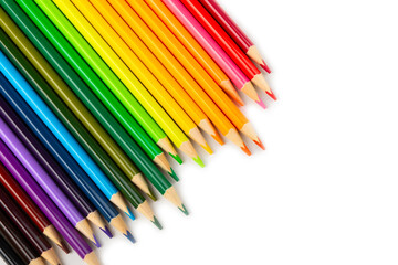 Colored pencils isolated on white background. Equipment for coloring. Stationery for creativity.Back to school. Flatlay. Children's Creativity and Education. Rainbow.