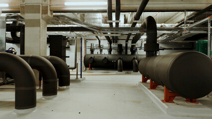 Industrial pipes and plumbing supplying an hvac system in a building