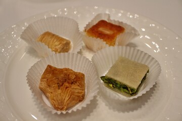 Middle Eastern dessert platter (baklava, baluria and basbousa) in Doha, Qatar