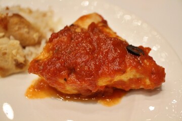 Grilled chicken breast with tomato sauce in Doha, Qatar