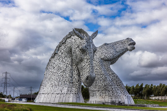 The Kelpies are the world's largest equine sculptures, standing at 30 meters tall and weighing over 300 tonnes each. They are located at The Helix near Falkirk in Scotland. Shot 5 July 2025.