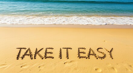 Relaxing Seaside Message: "Take it Easy" Written in Sand on a Sunny Beach, Ocean Waves
