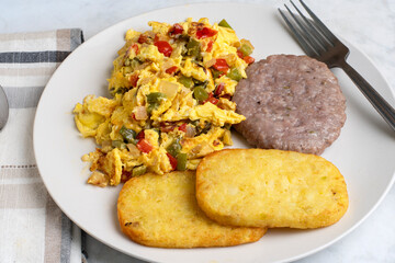 scramble eggs with sausage patty and hash browns